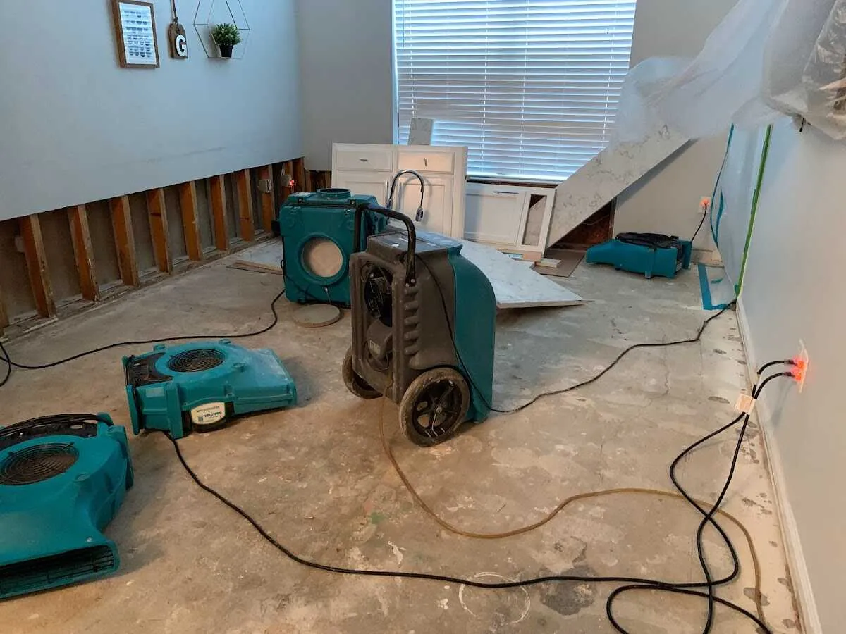 Dehumidifier in flood-cut room for Water Damage Restoration in Maltby